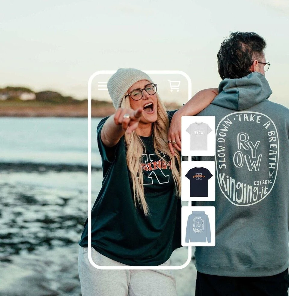 Social media creators on the beach wearing custom printed clothing created with Triplacement's merch maker.